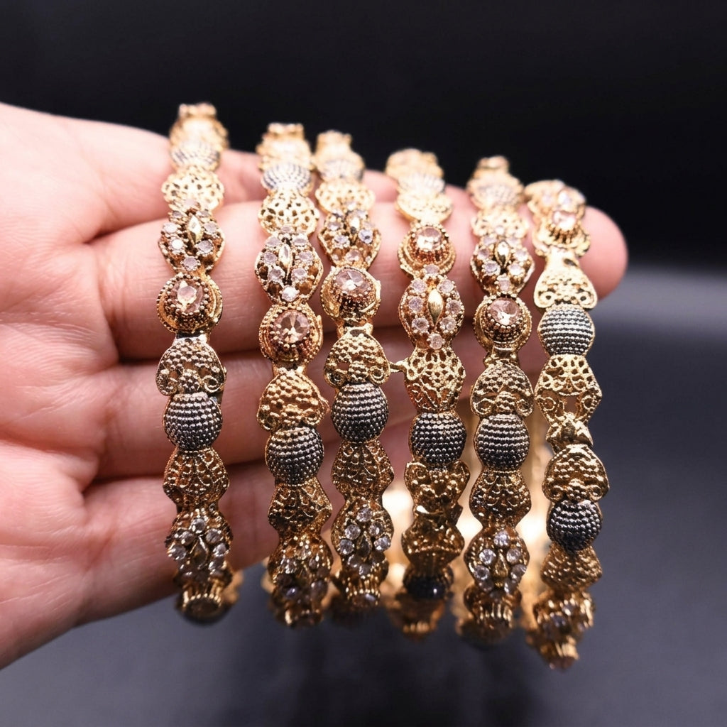 Golden bangles with champagne stones(set of 6)