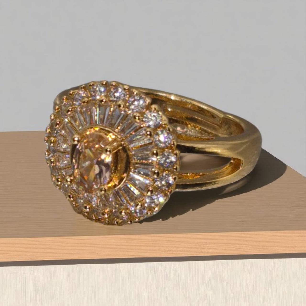 Golden ring with champagne stones
