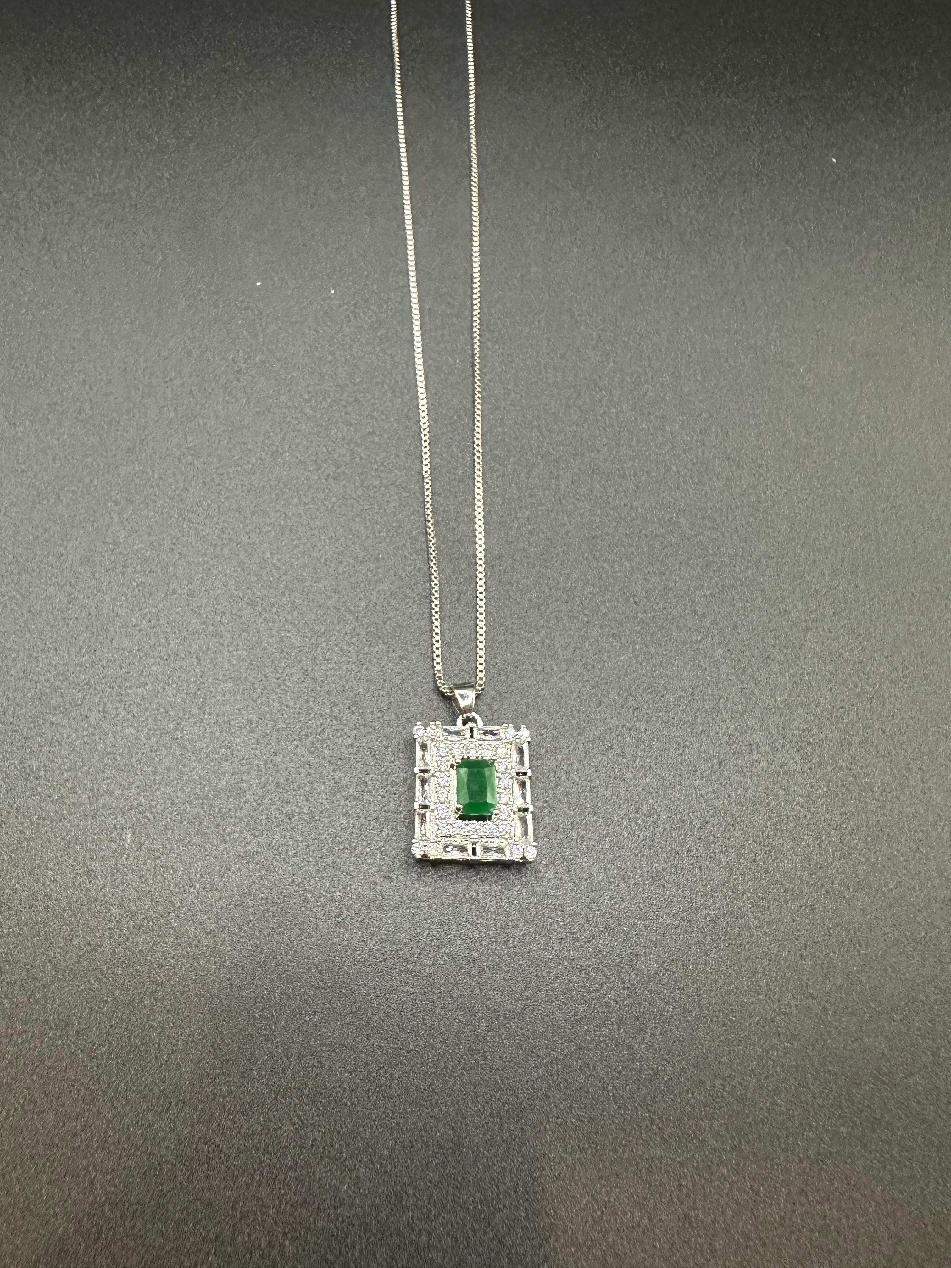 Delicate emerald locket set