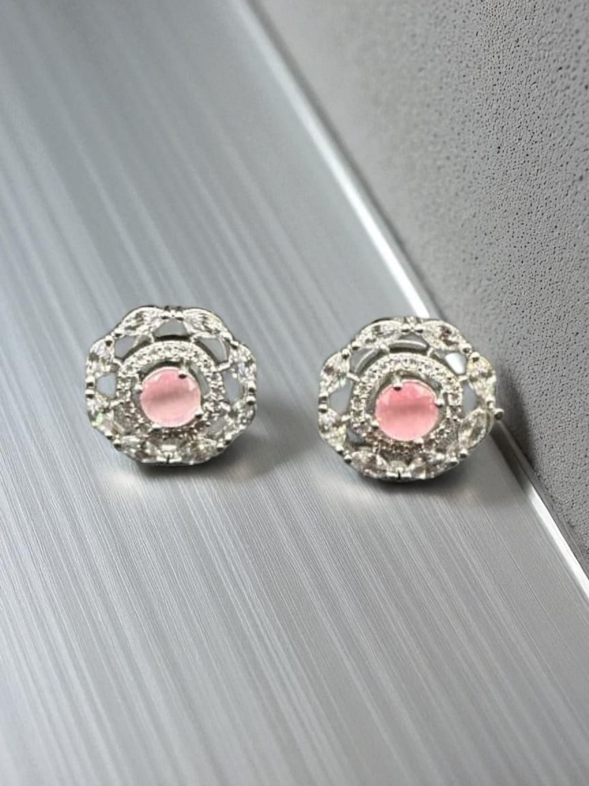 Elegant zircon studs with pink stone inside