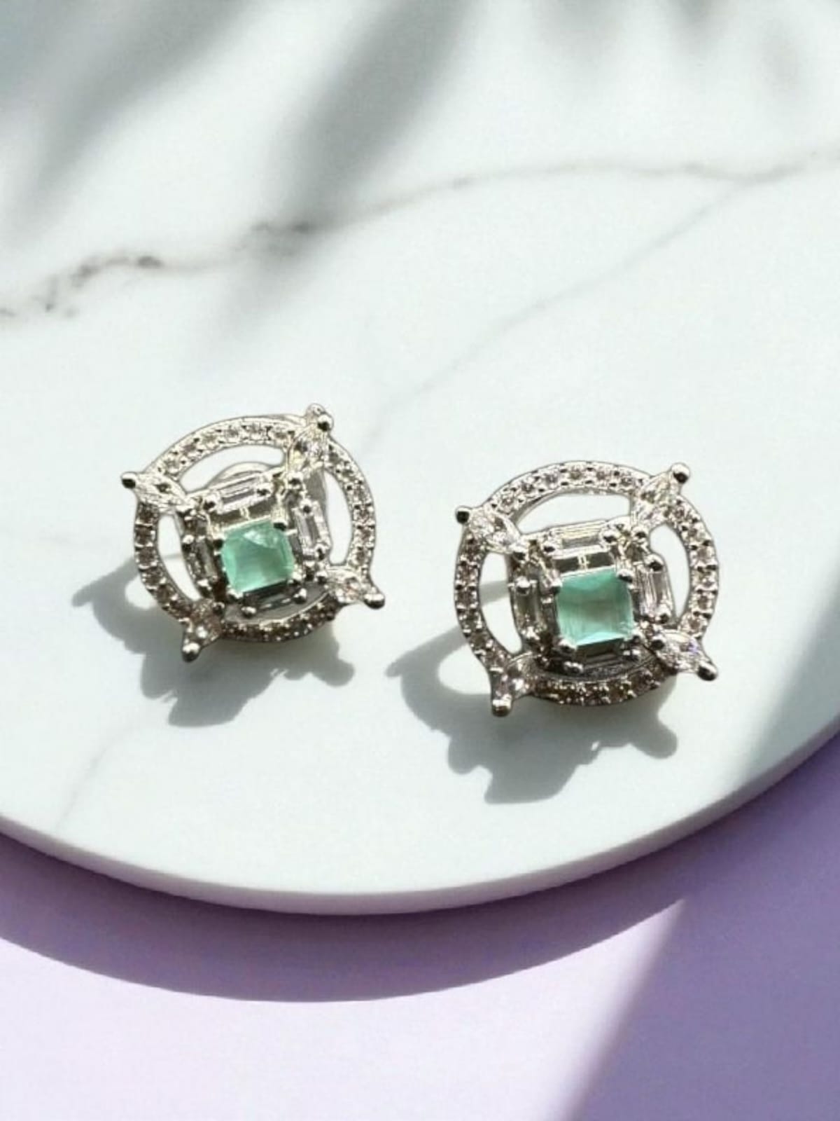 Stylish zircon studs with aqua stone