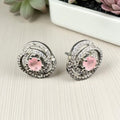 classic zircon studs with pink stone inside
