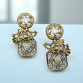 Turkish style earrings with champagne stones