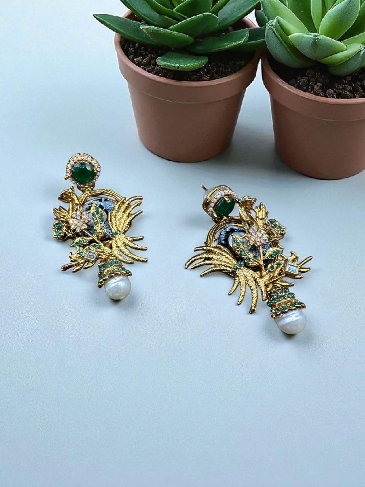 Turkish elegant earrings with emerald