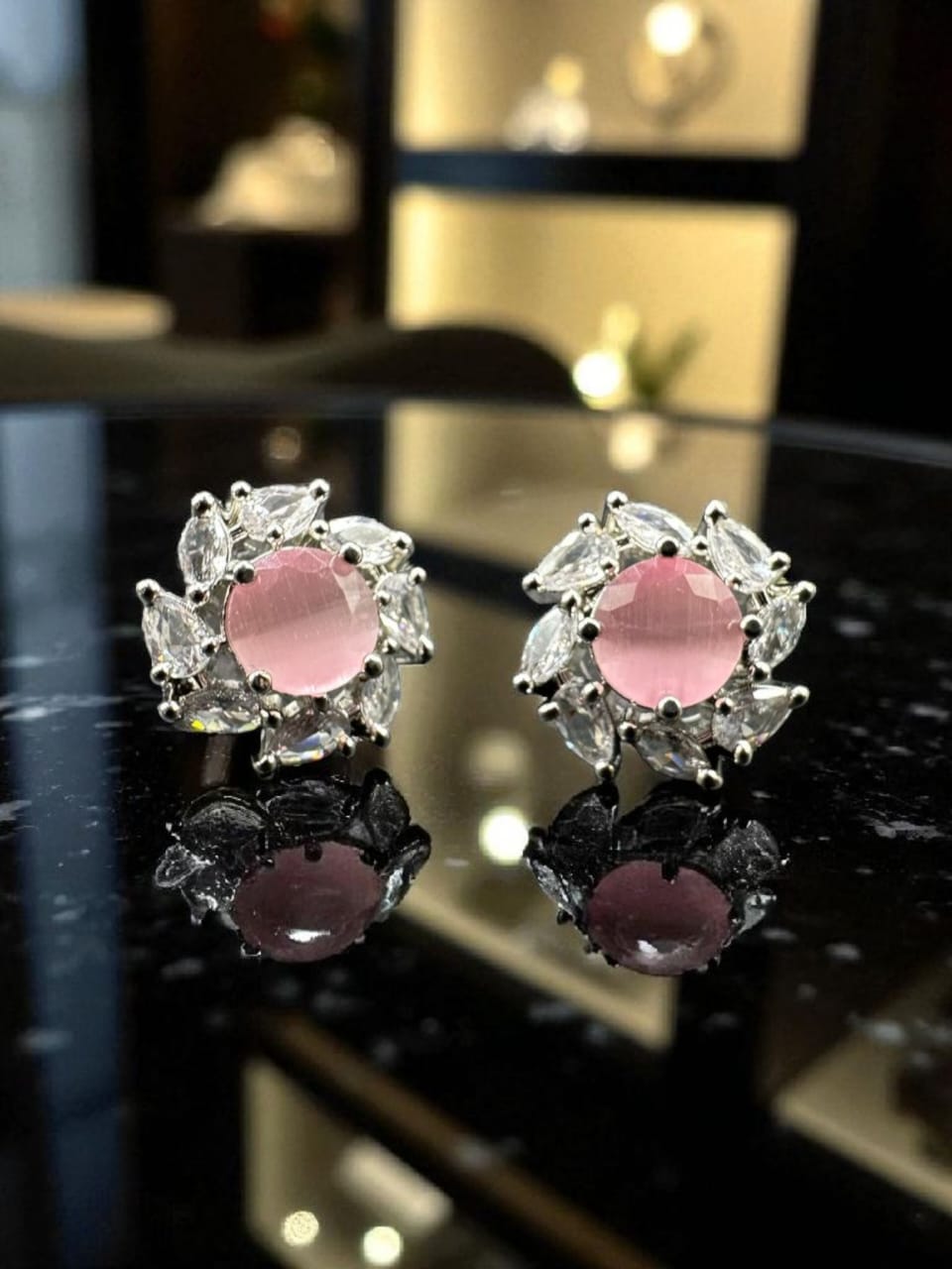 Zircon studs with pink Stone