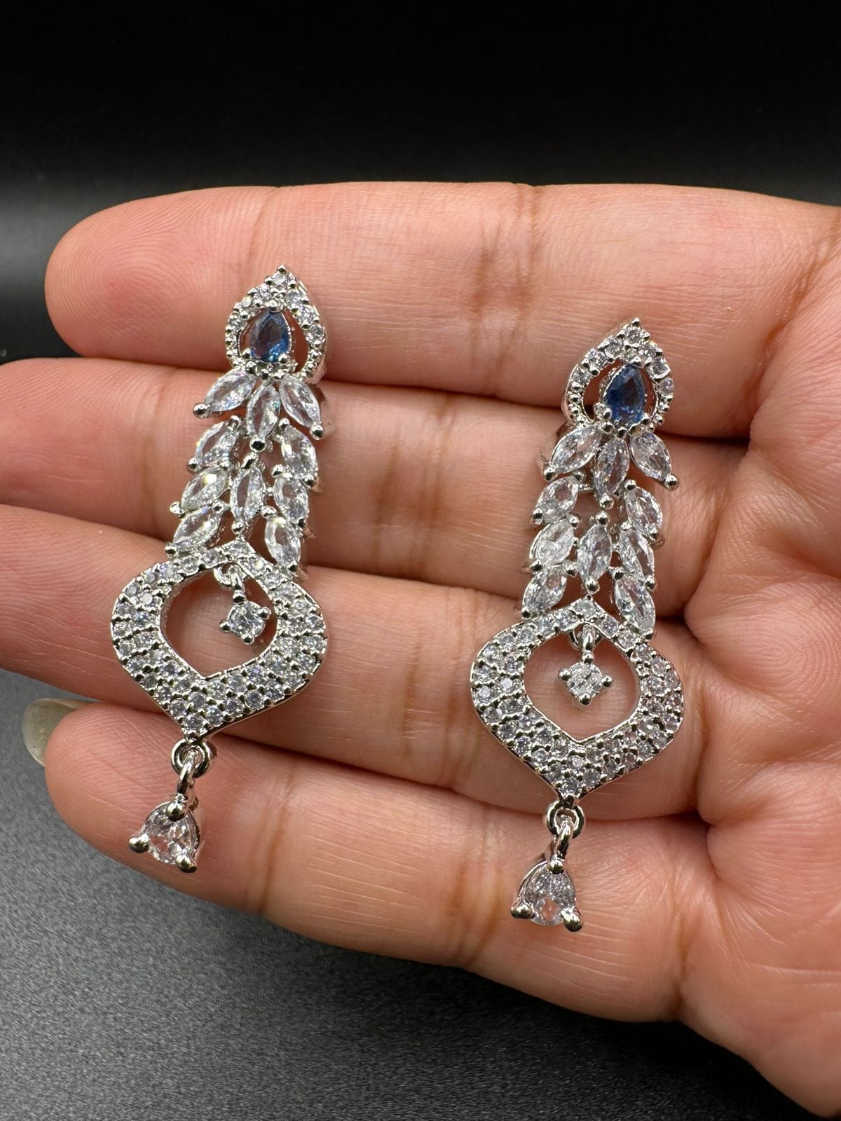 Silver earrings with zircon and sapphire