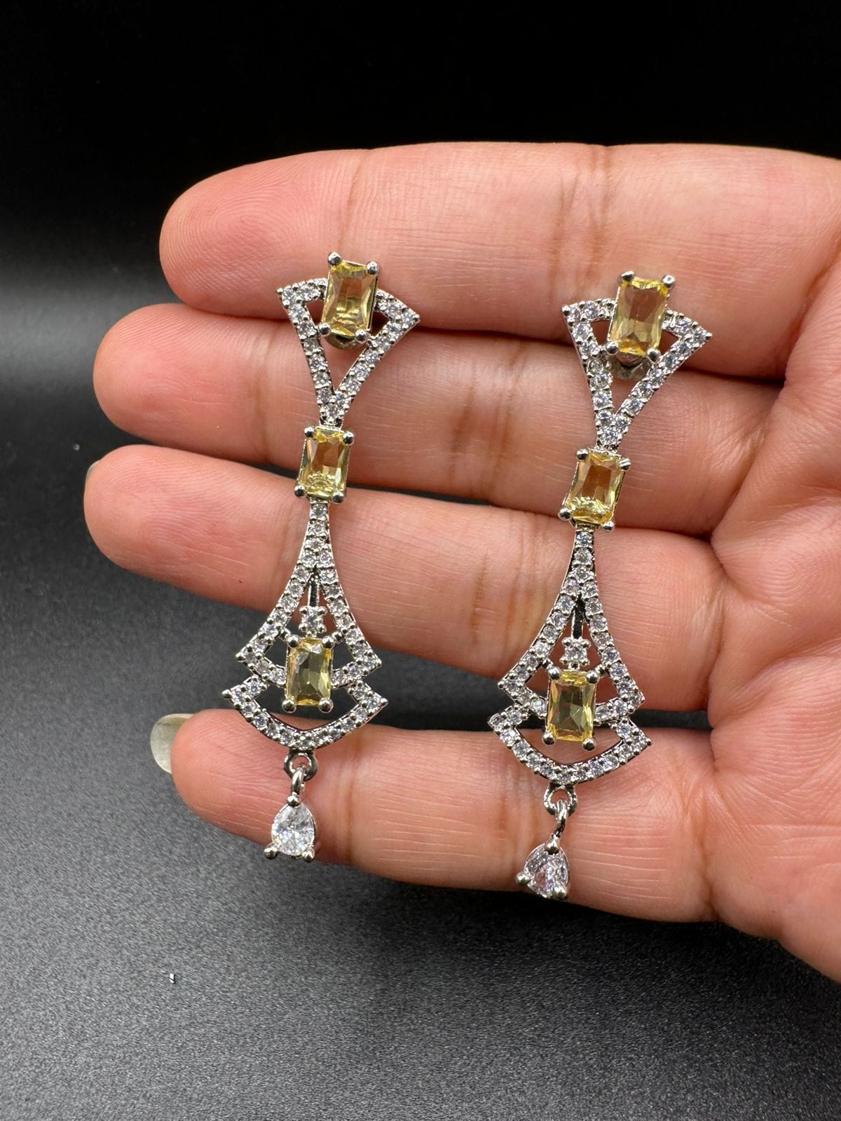 Zircon chandelier earrings with yellow stones