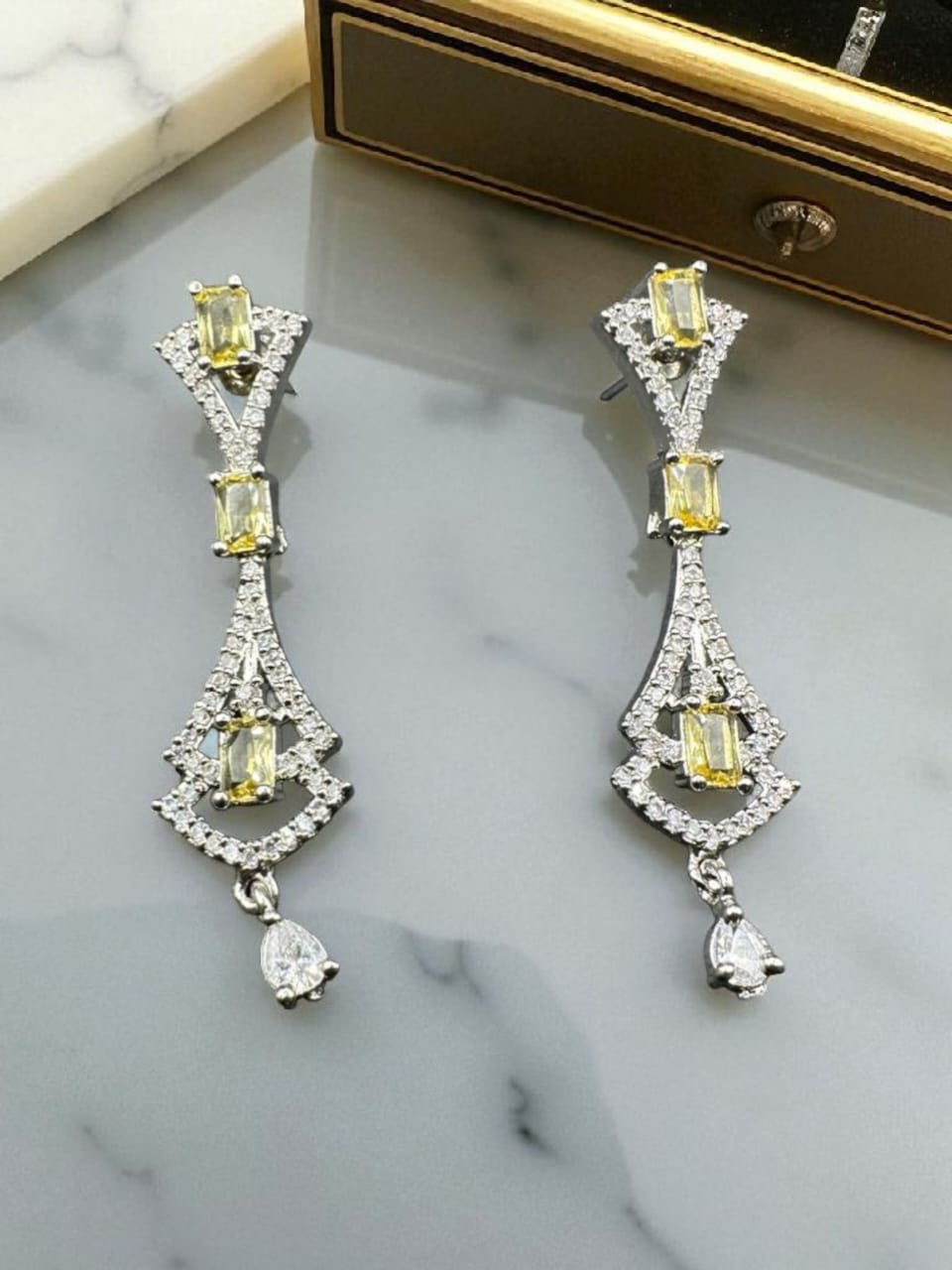 Zircon chandelier earrings with yellow stones