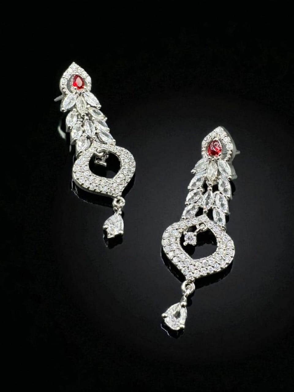 Silver earrings with zircon and ruby