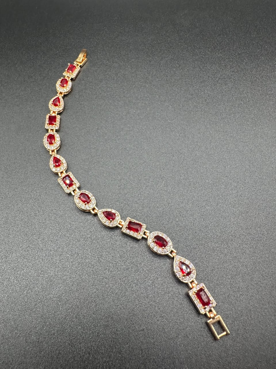 Ruby bracelet with golden base