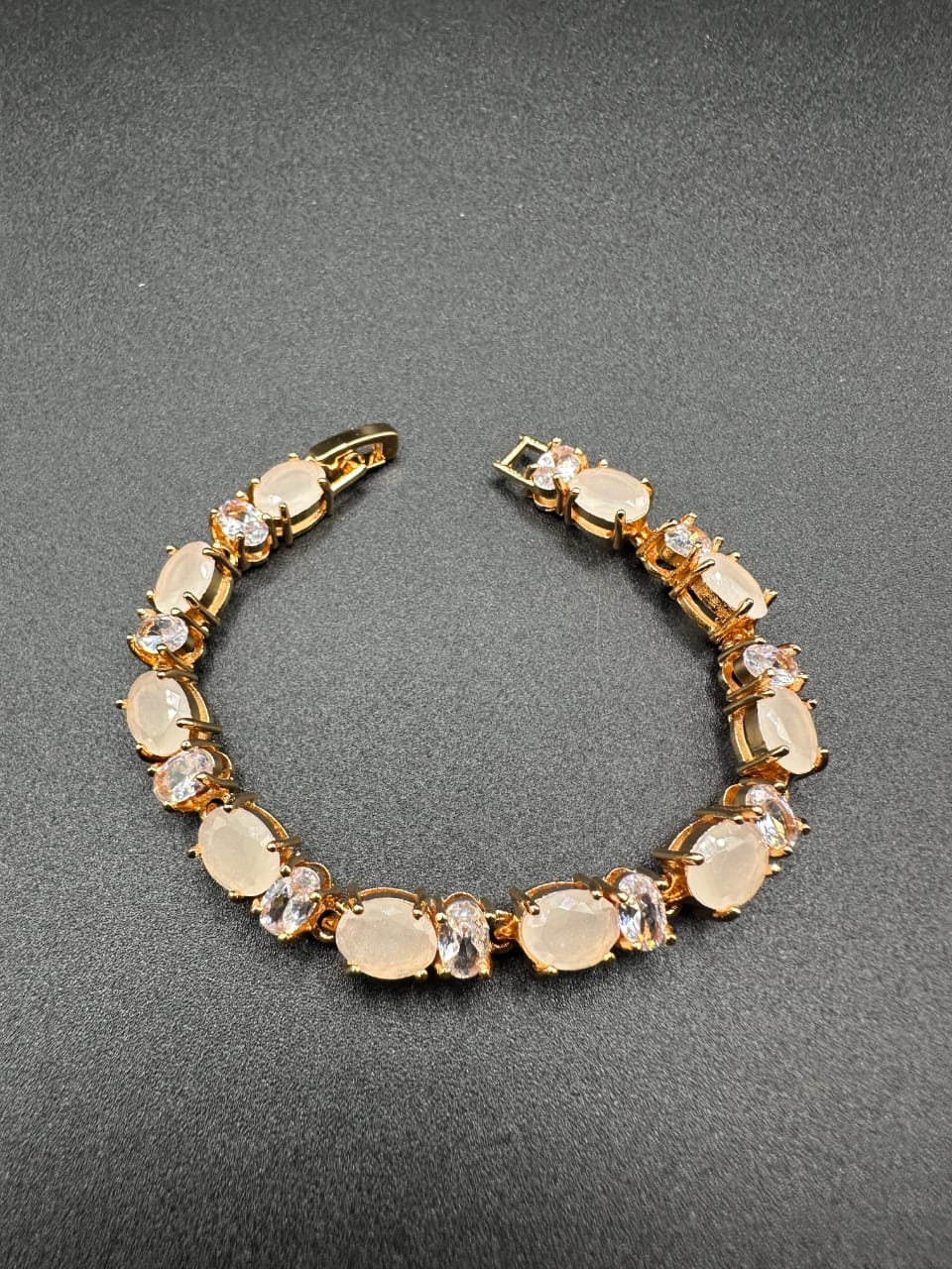 Skin tone stones bracelet with golden base for girls