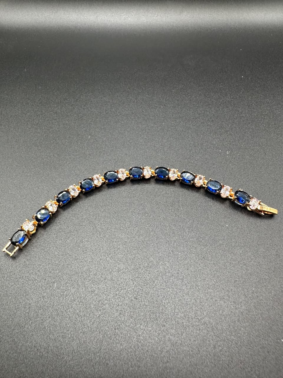 Sapphire bracelet with golden base for girls