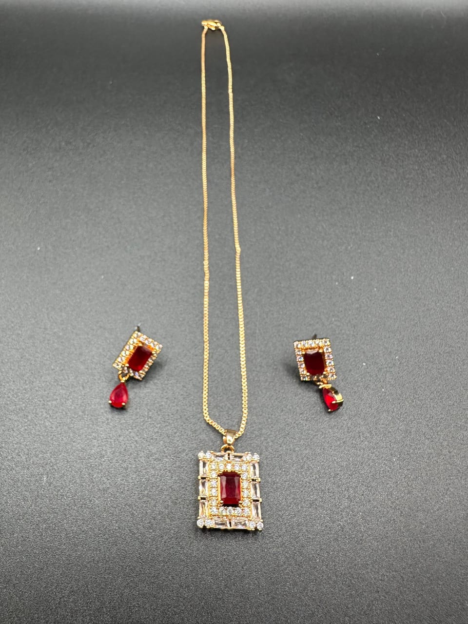 Delicate ruby locket set