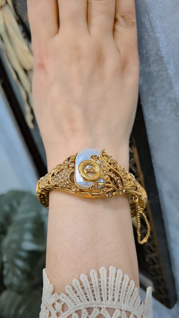 Turkish style bangle with champagne stones