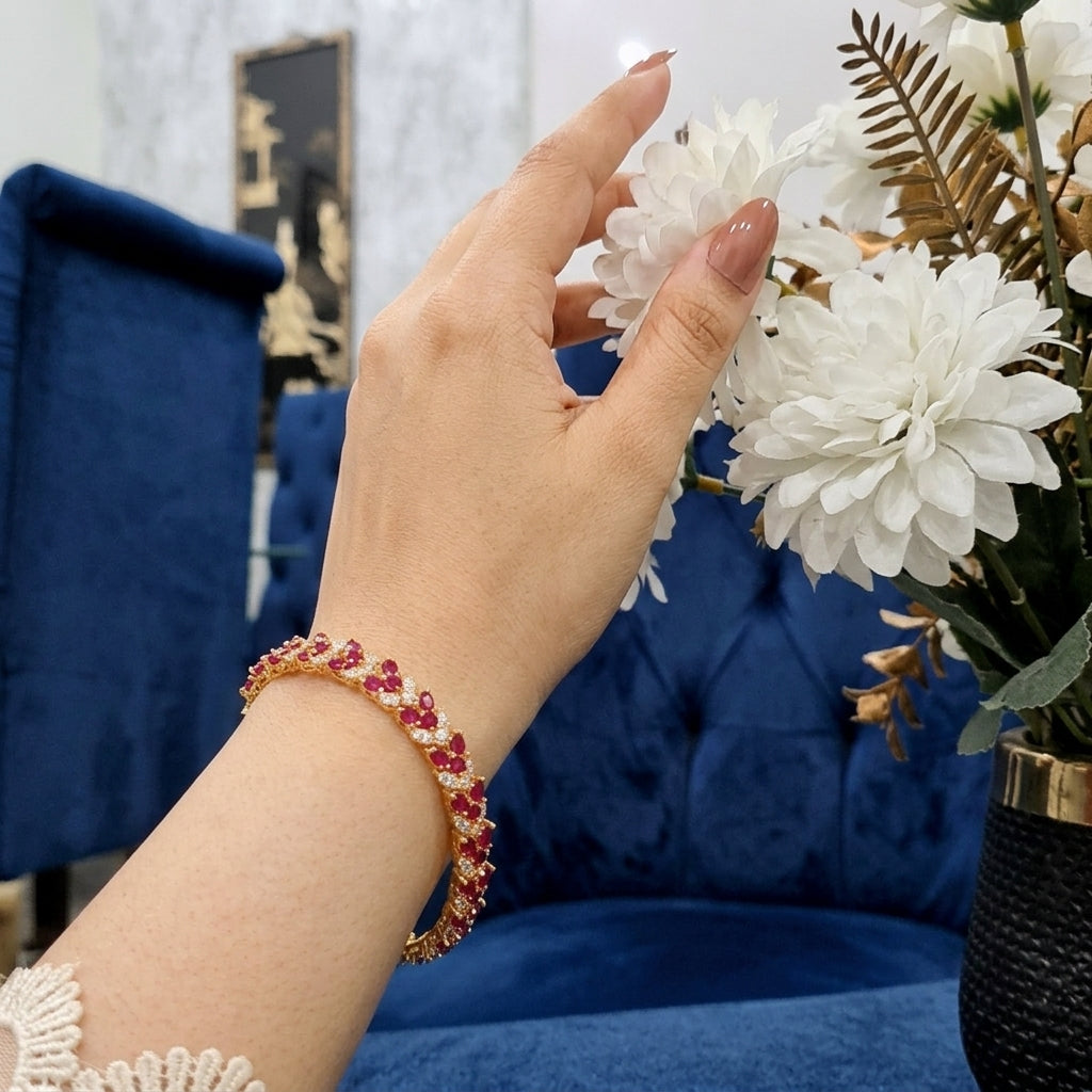 Zircon stones bracelet with golden base