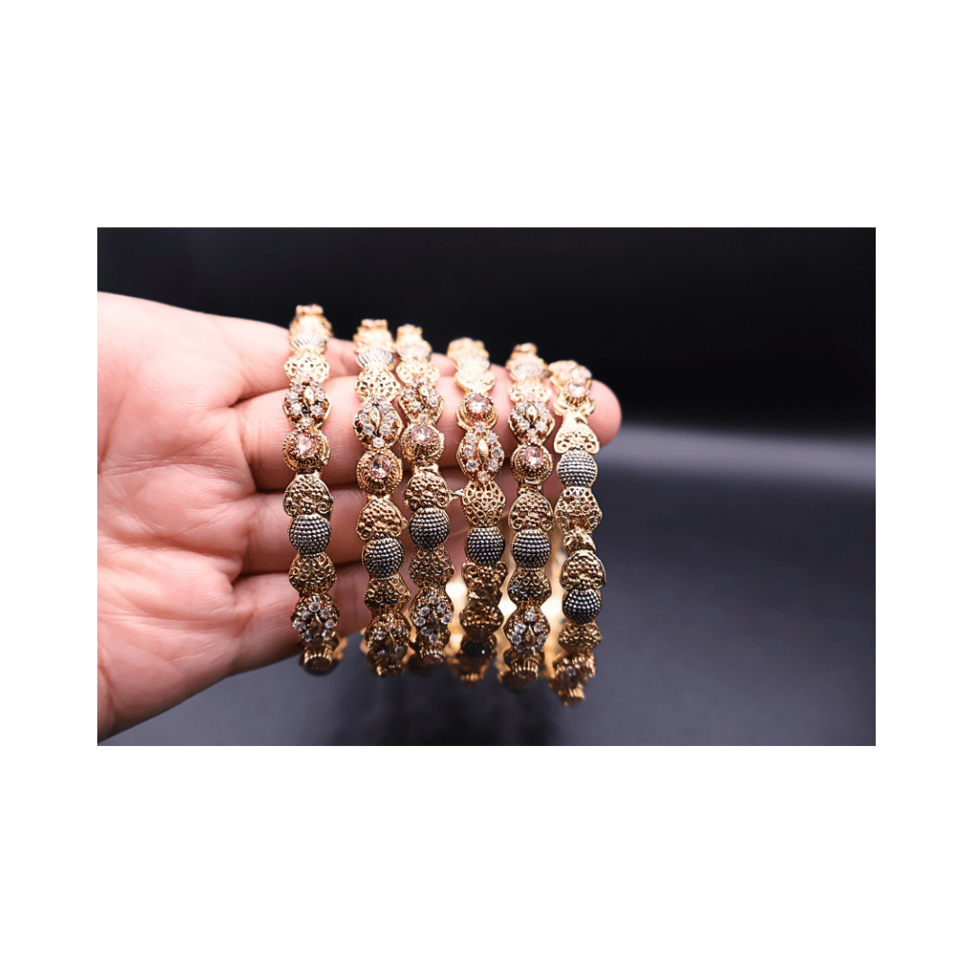 Golden bangles with champagne stones(set of 6)