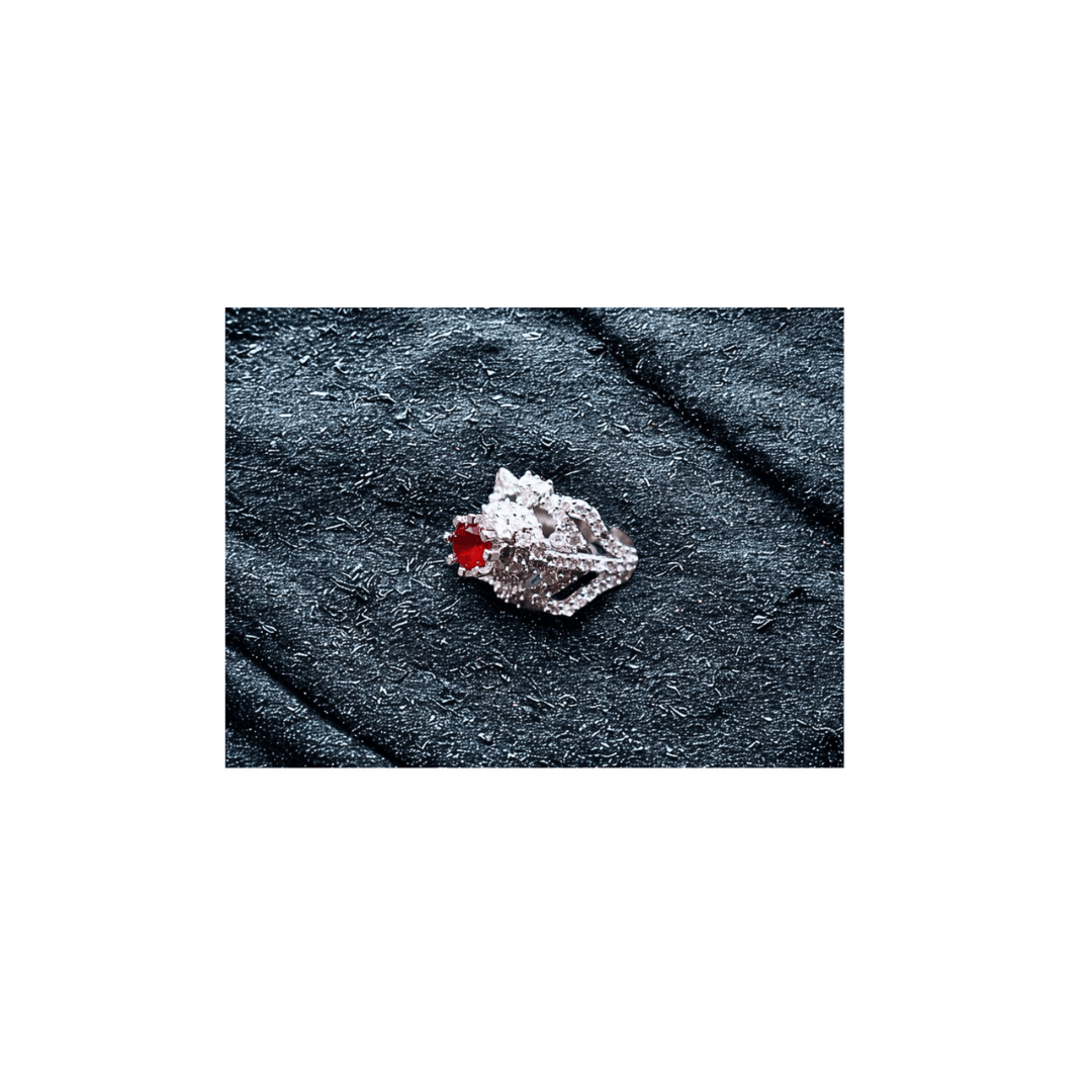 Turkish ruby ring with zircons in silver frame