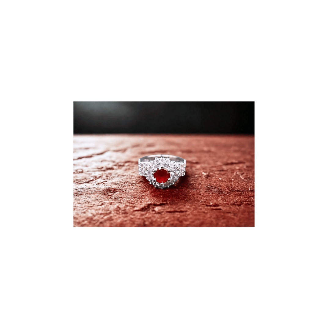 Turkish ruby ring with zircons in silver frame