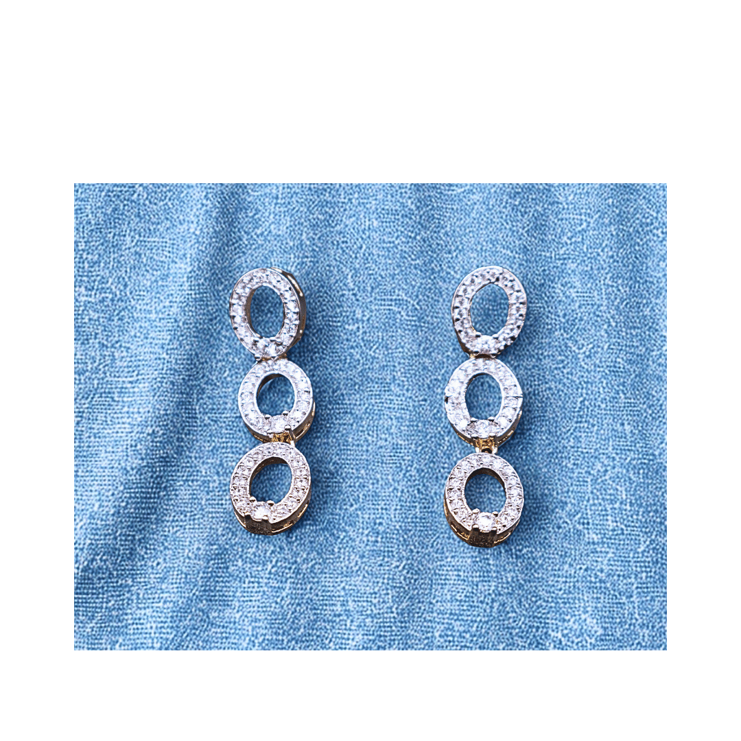 Elegant zircon earrings in silver frame