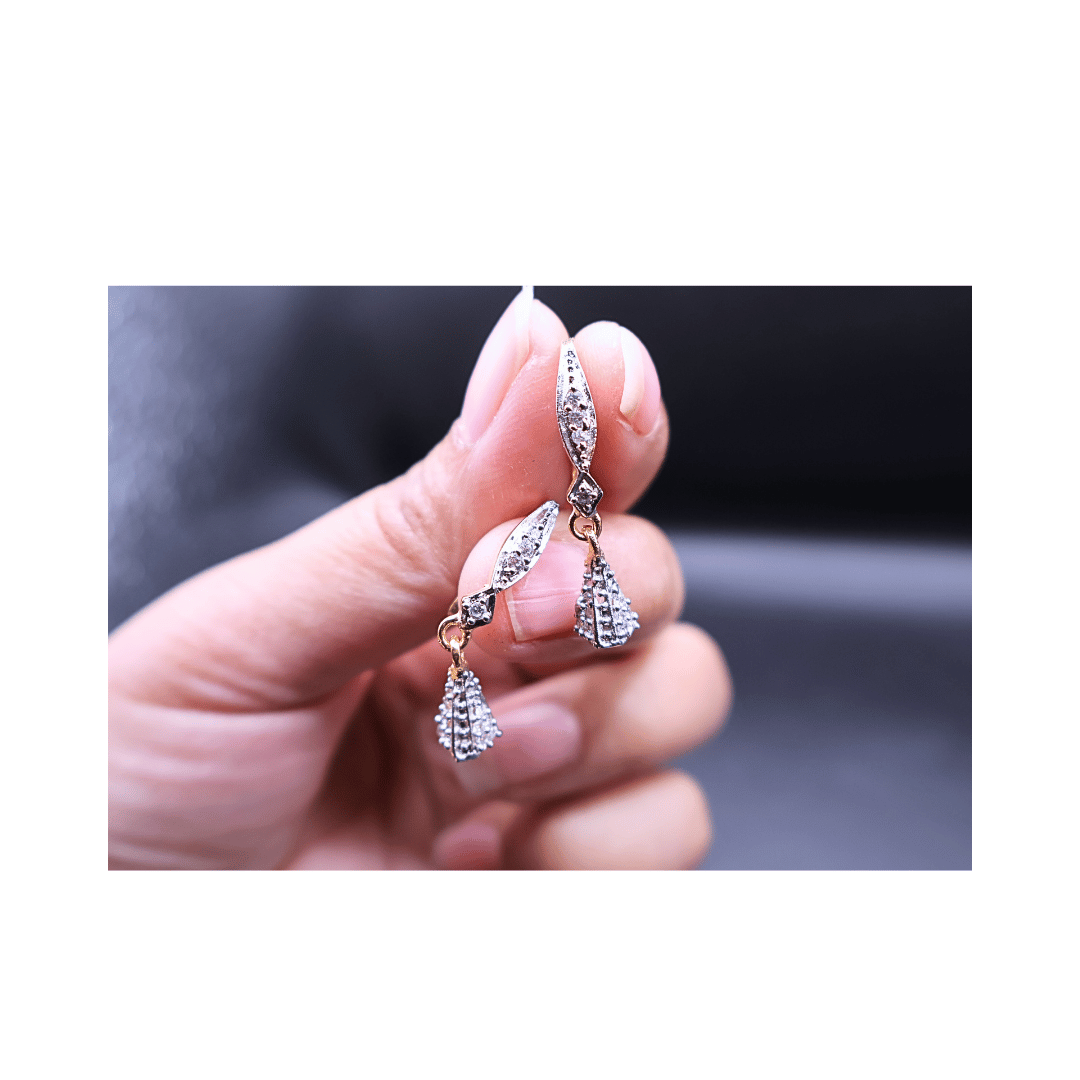 Dangle earrings in golden frame with zircon