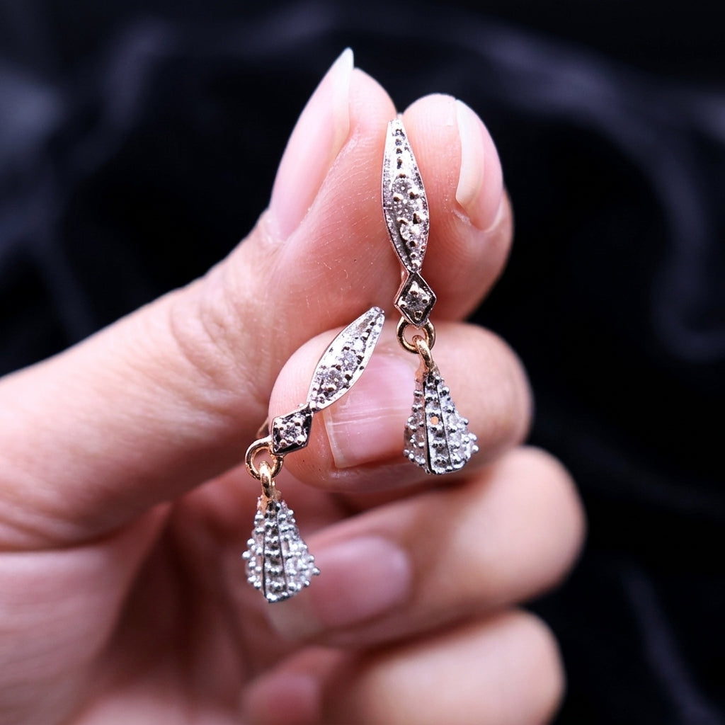 Dangle earrings in golden frame with zircon