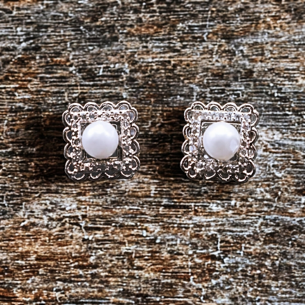 Square shaped studs with pearl in center