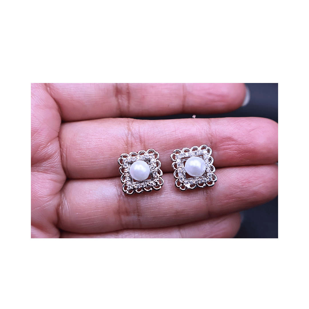 Square shaped studs with pearl in center