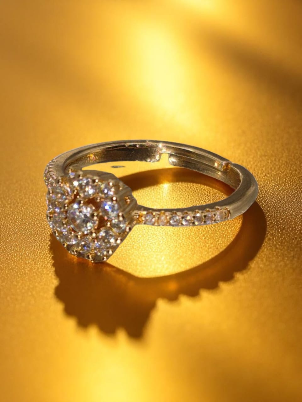 Golden elegant ring with zircons
