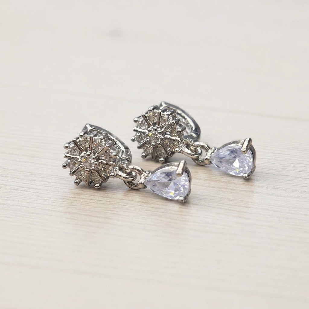 Dangle style silver earrings with zircon