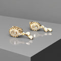 Gold plated earrings with white stone