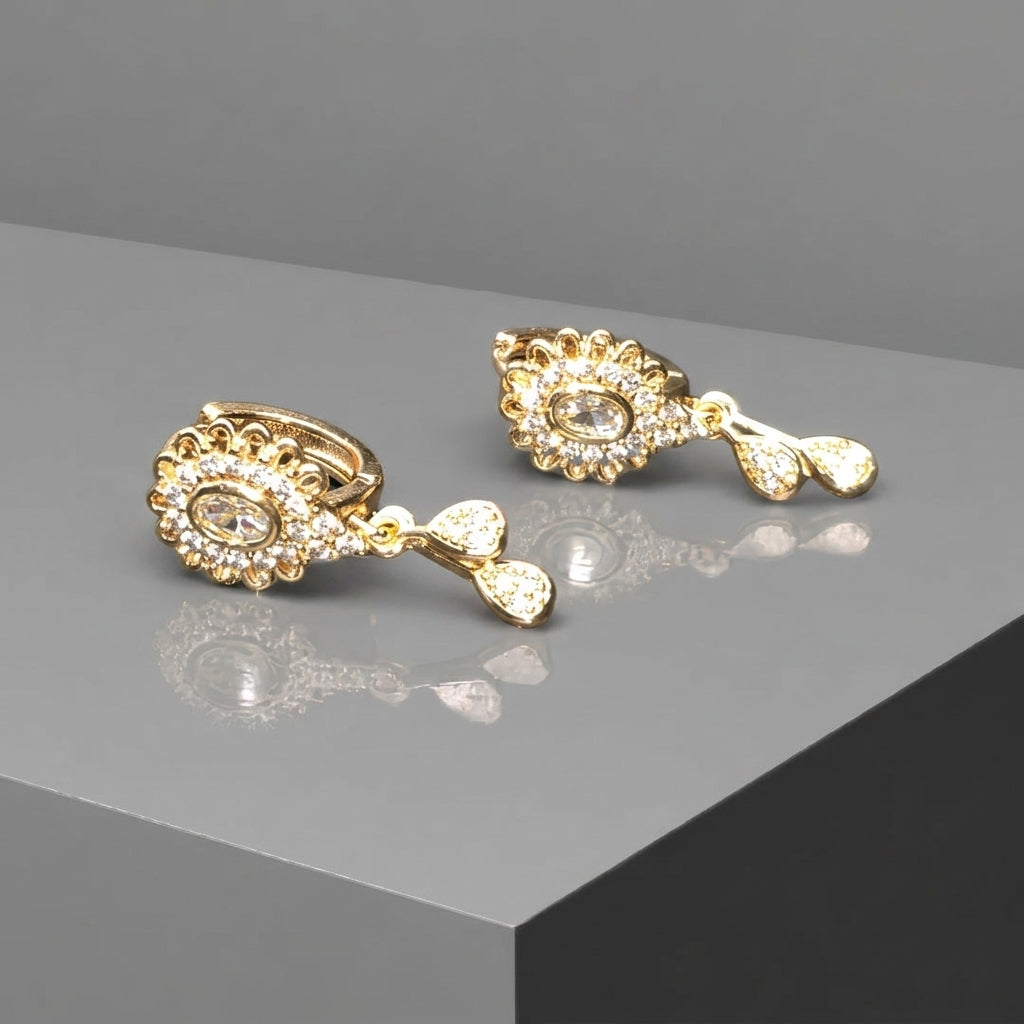 Gold plated earrings with white stone