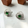 Classic zircon studs with emerald inside