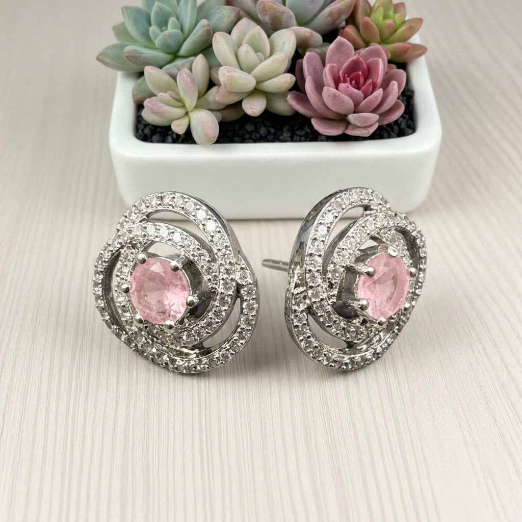 classic zircon studs with pink stone inside