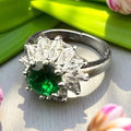 silver adjustable ring with emerald