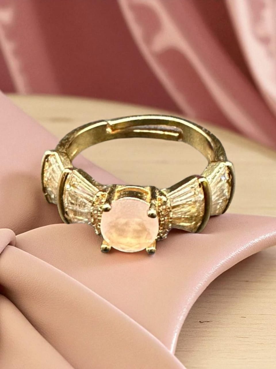 golden adjustable ring with pink stone