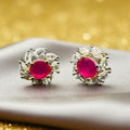 Zircon studs with ruby in gold base