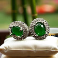 Zircon studs with emerald