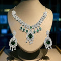 Silver plated zircon set with emerald