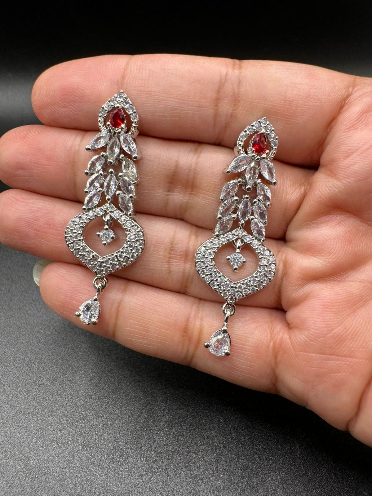Silver earrings with zircon and ruby