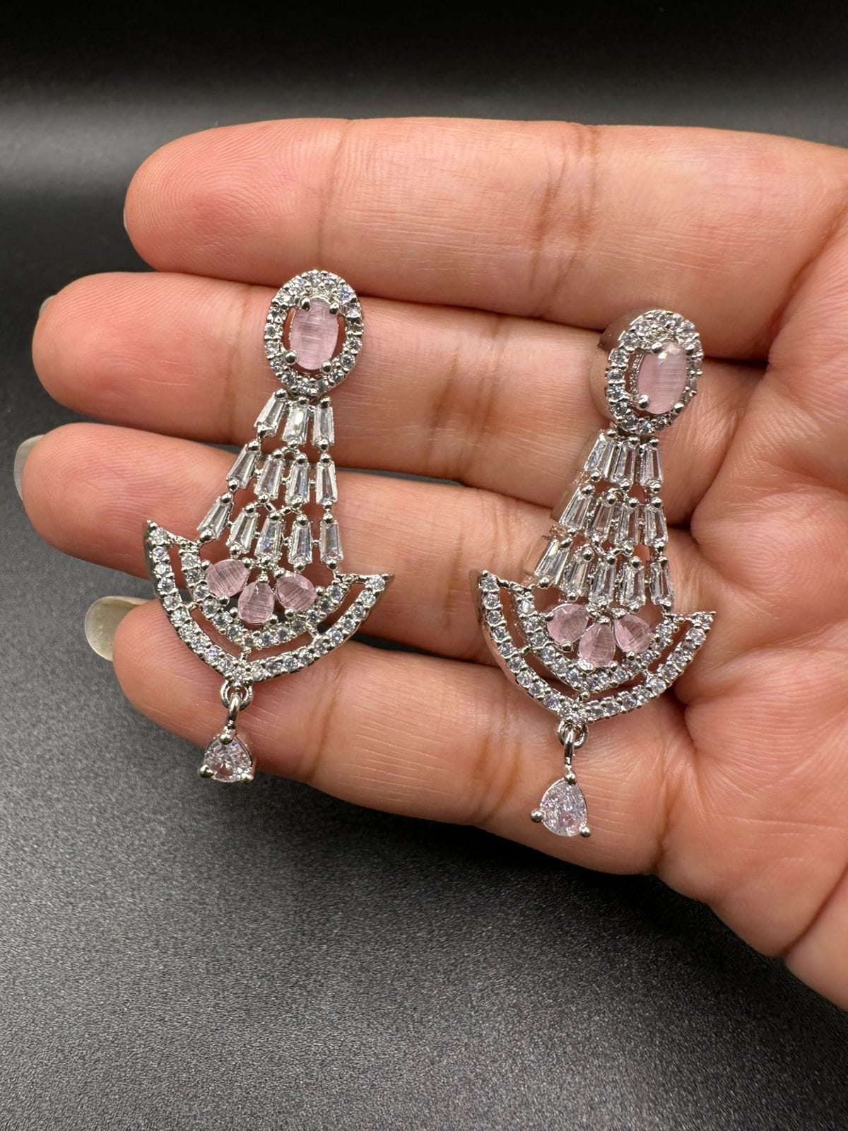 Chandelier earrings with zircon and pink stones