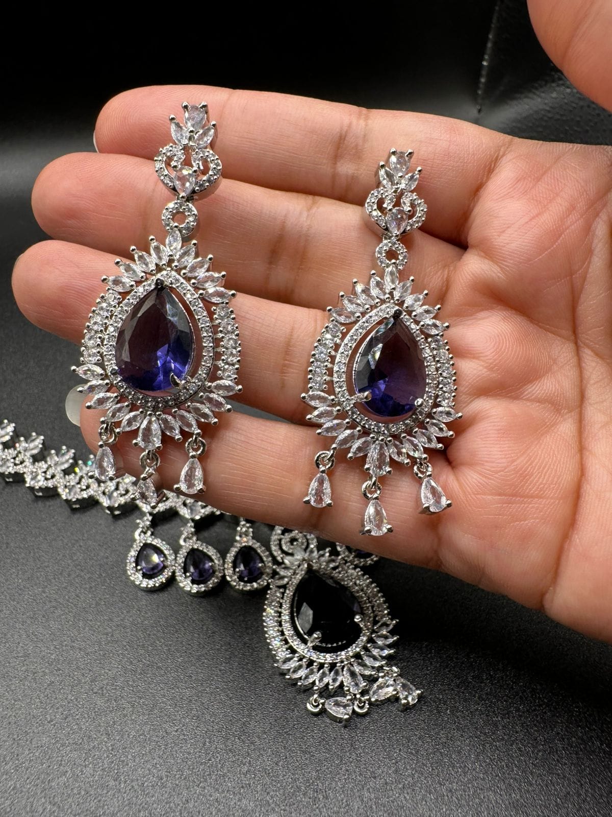 Silver plated zircon set with sapphire