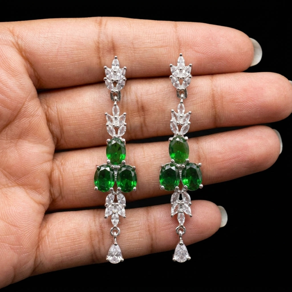 Silver plated zircon set with emerald