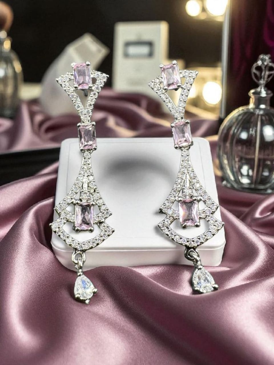Zircon chandelier earrings with pink stones