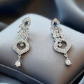 Silver earrings with zircon and sapphire