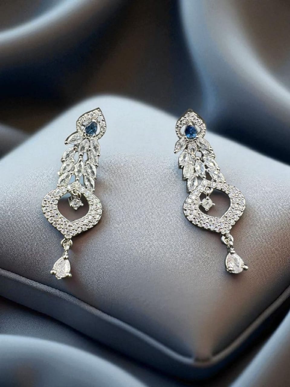 Silver earrings with zircon and sapphire