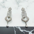Silver earrings with zircon