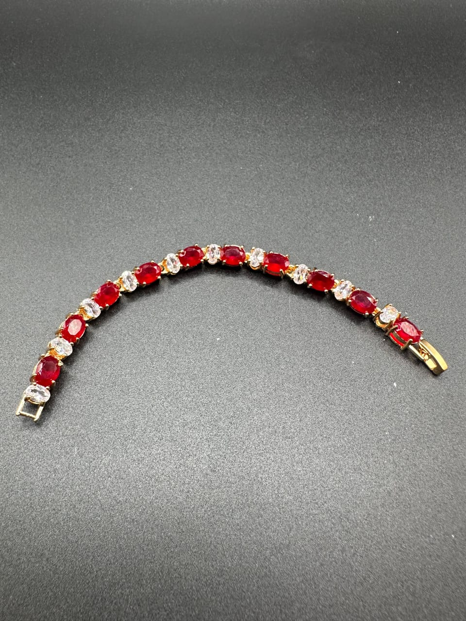 Ruby bracelet with golden base for girls