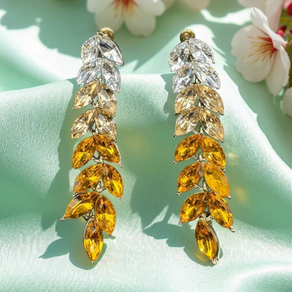 Drop earrings in yellow tones