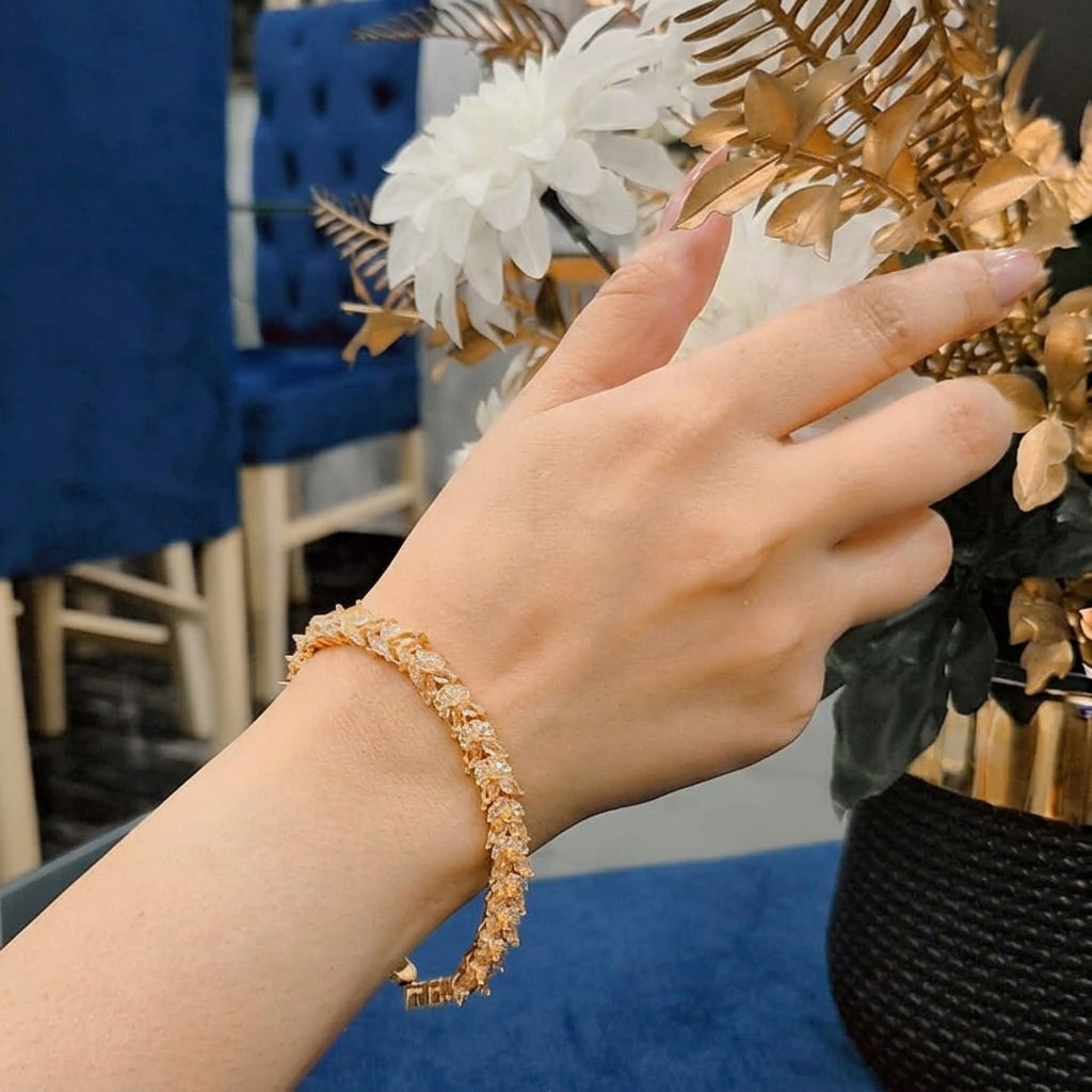 Zircon stones bracelet with golden base